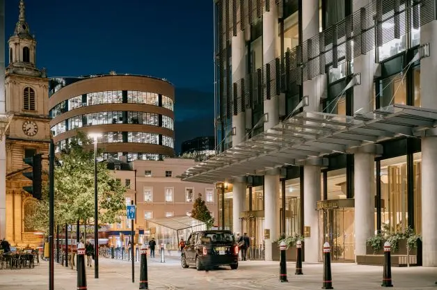 Night time view of the entrance to the Pan Pacific London hotel