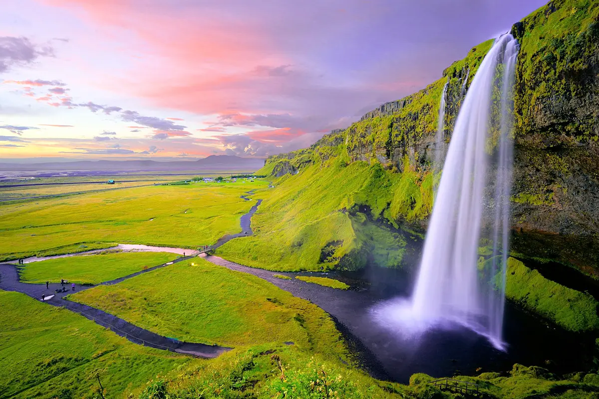 Image show the spectacular Seljalandfoss Waterfall in Iceland