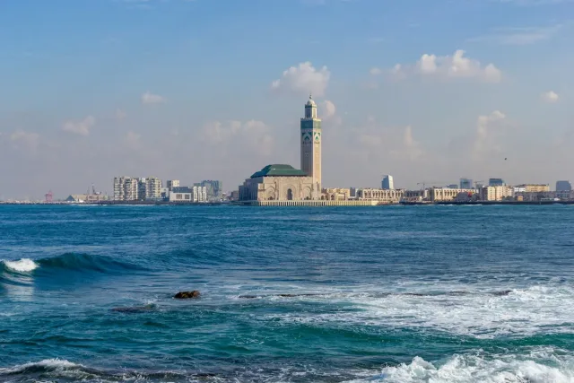 View across water to Hasan II Mosque in Casablanca, Morocco