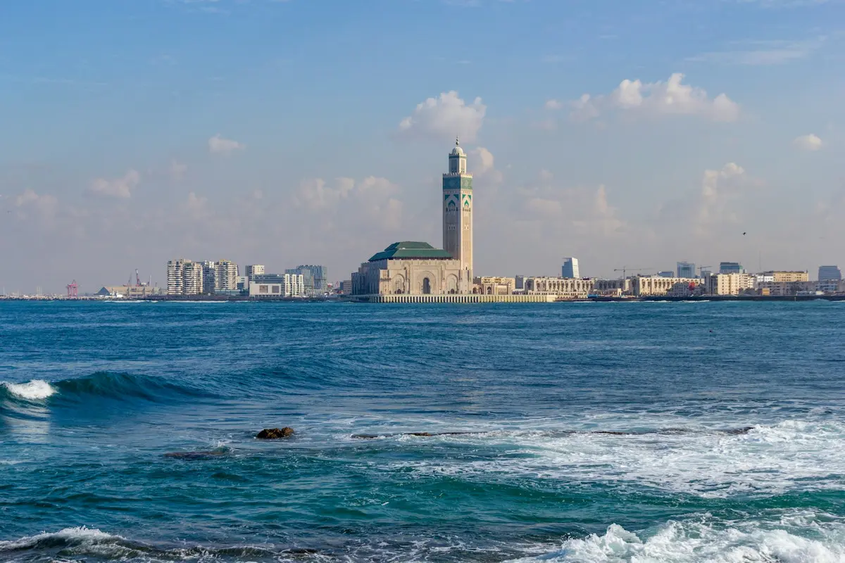 View across water to Hasan II Mosque in Casablanca, Morocco