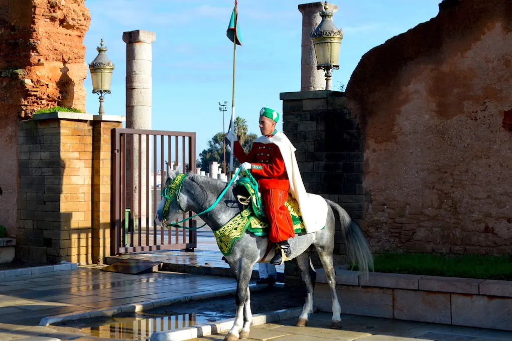 Image shows a Royal Guard on horseback in Rabat, Morocco