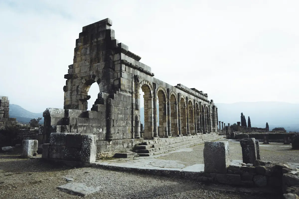 Image shows the Roman ruins at Volubilis, Morocco