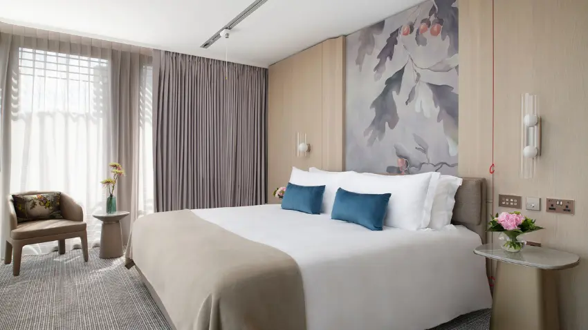 Image shows an accessible guest room, including ceiling tracking hoist, at Pan Pacific London